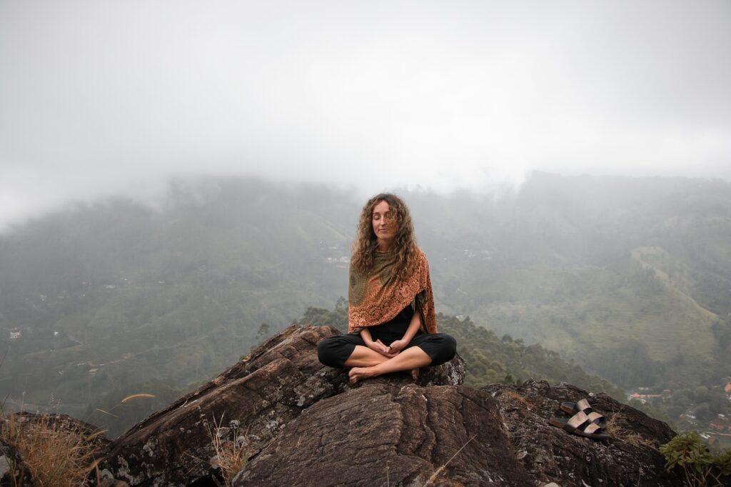 meditate-woman mountain top